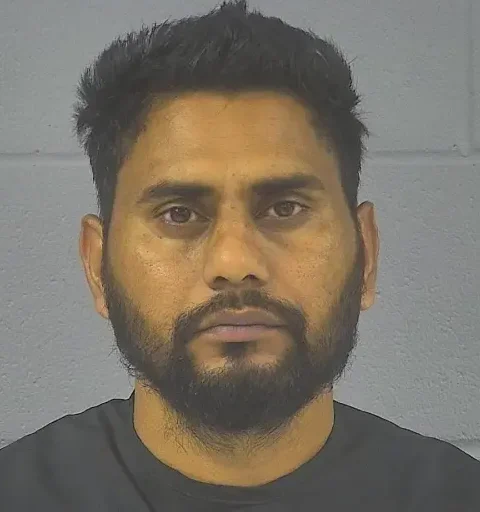 Deepak Kumar in ICE custody after he was caught hauling nearly $3 million worth of stolen tungsten oxide powder.