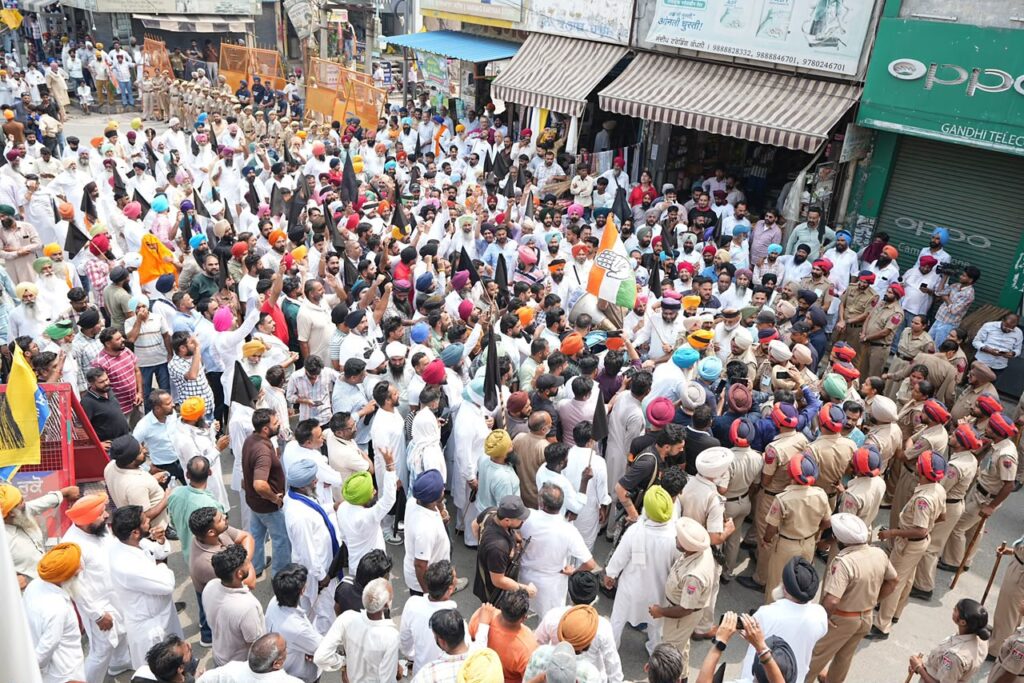 Congress protest  in solidarity with Mohanjit who was brutalized by police for similar protest  